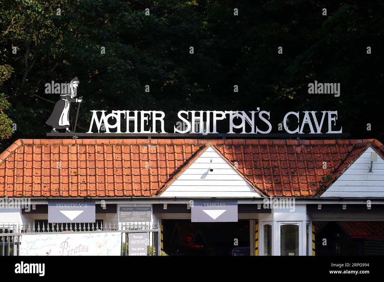 The entrance sign to Mother Shiptons Cave visitor attraction in Knaresborough,North Yorkshire,UK Stock Photo