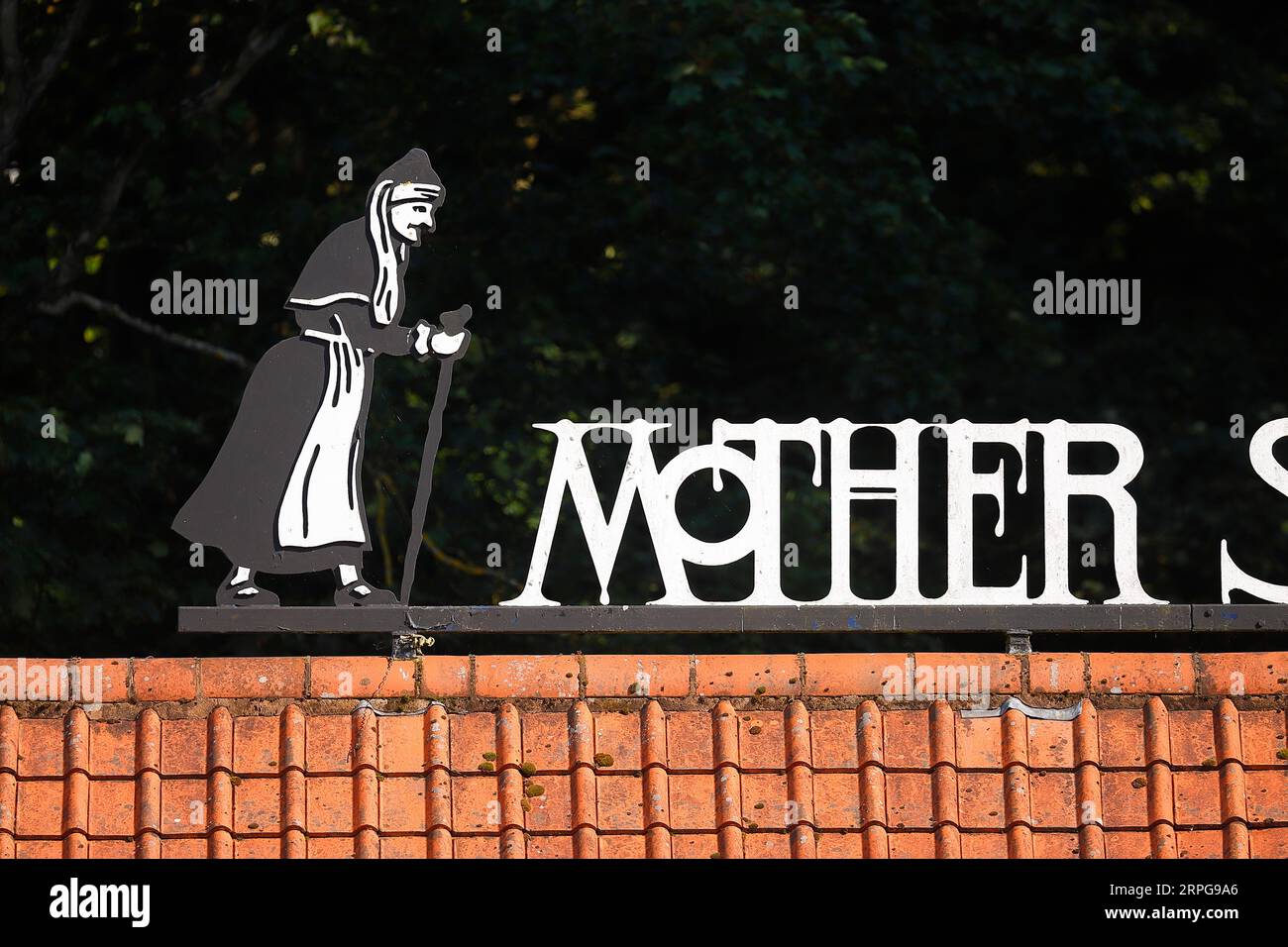 The entrance sign to Mother Shiptons Cave visitor attraction in Knaresborough,North Yorkshire,UK Stock Photo