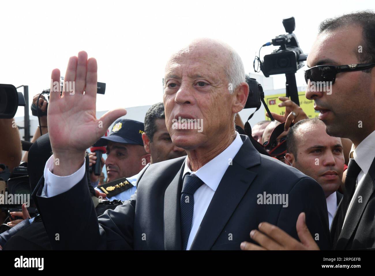 191013 -- TUNIS, Oct. 13, 2019 -- Presidential candidate Kais Saied participates in the second round of presidential election at a polling station in Tunis, Tunisia, Oct. 13, 2019. Polling stations in Tunisia s 27 constituencies opened at 8 a.m. 0700 GMT local time on Sunday to start the second round of presidential election. Kais Saied, an independent candidate and a constitutional professor winning 18.4 percent of the votes in the first round, faces Nabil Karoui, leader of the Heart of Tunisia party who got 15.58 percent of the votes in the first round of the election held on Sept. 15. Photo Stock Photo