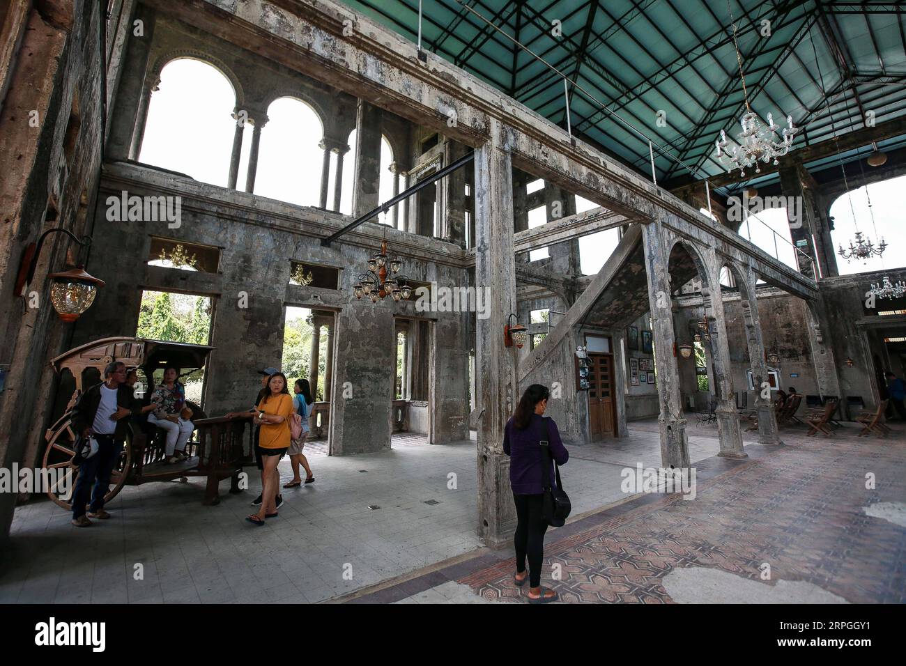 191016 -- TALISAY CITY, Oct. 16, 2019 -- People visit a tourist spot called The Ruins in Talisay City, the Philippines, Oct. 16, 2019.  PHILIPPINES-TALISAY CITY-TOURIST SPOT-THE RUINS ROUELLExUMALI PUBLICATIONxNOTxINxCHN Stock Photo