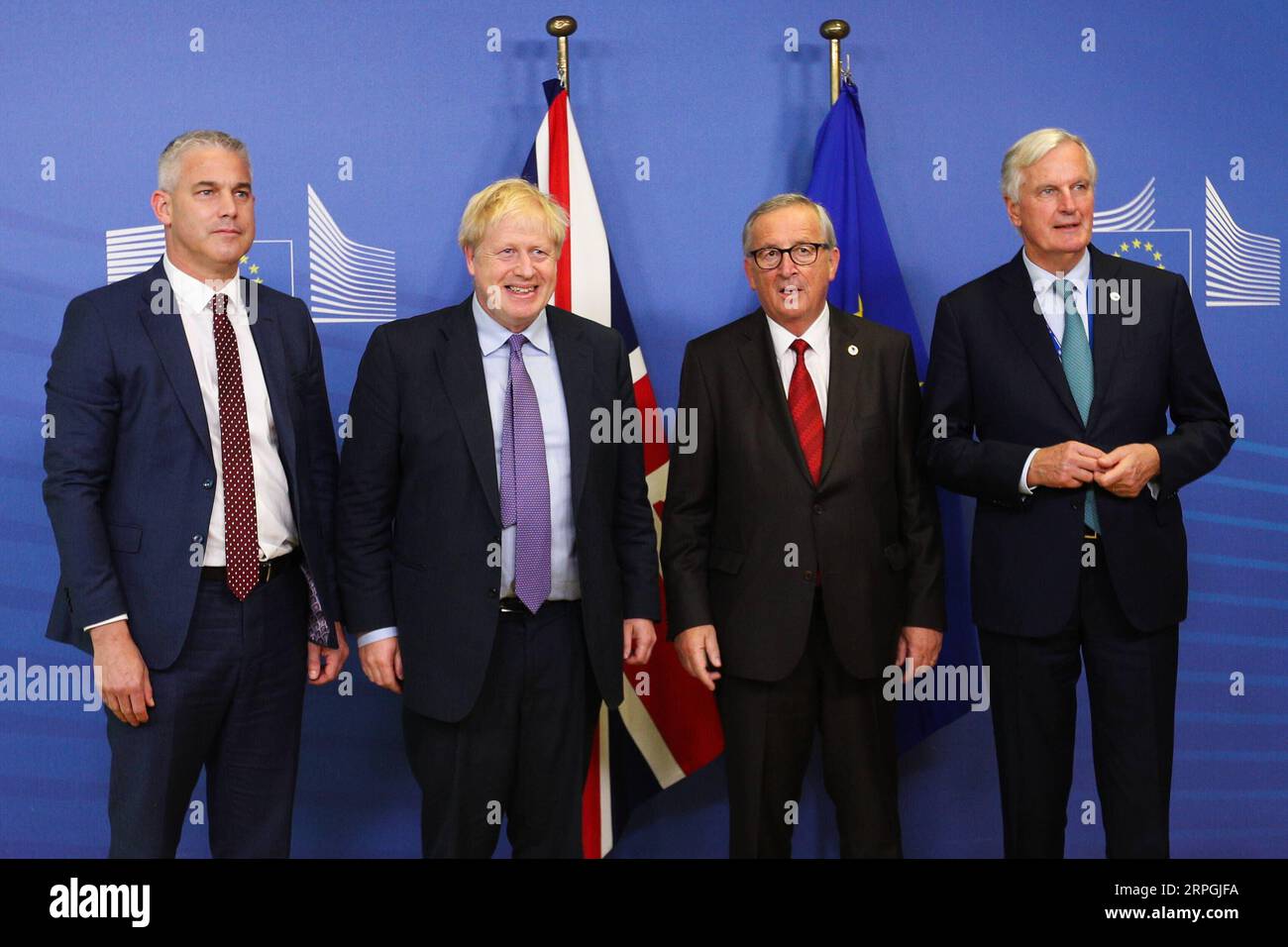 191017 -- BRUSSELS, Oct. 17, 2019 -- British Prime Minister Boris Johnson 2nd L, British Brexit Secretary Stephen Barclay 1st L, President of the European Commission Jean-Claude Juncker 2nd R and the EU s chief Brexit negotiator Michel Barnier pose for photos after meeting the press at the European Commission headquarters in Brussels, Belgium, Oct. 17, 2019. The European Union and Britain have reached a new Brexit deal, Jean-Claude Juncker said Thursday on his twitter account.  BELGIUM-BRUSSELS-EU-BREXIT-PRESS CONFERENCE ZhengxHuansong PUBLICATIONxNOTxINxCHN Stock Photo