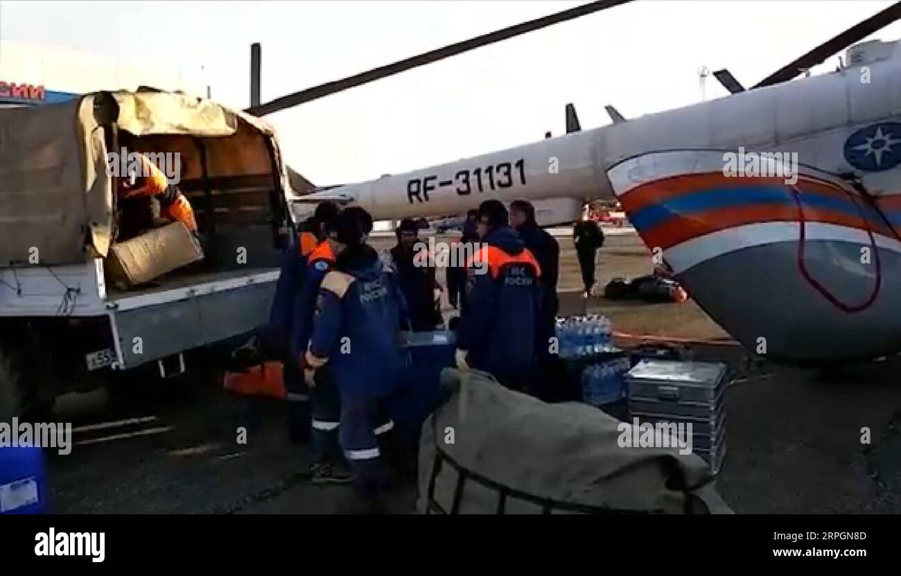 191019 -- ST. PETERSBURG, Oct. 19, 2019 -- Video screenshot shows staff members of the Russian Emergencies Ministry heading for a collapsed dam in the Kuraginsky district of Russia s Krasnoyarsk region, Oct. 19, 2019. At least six people were killed and 14 others injured after a dam collapsed in the Kuraginsky district of Russia s Krasnoyarsk region on Saturday, local media reported. RUSSIA-KRASNOYARSK REGION-DAM COLLAPSE lujinbo PUBLICATIONxNOTxINxCHN Stock Photo
