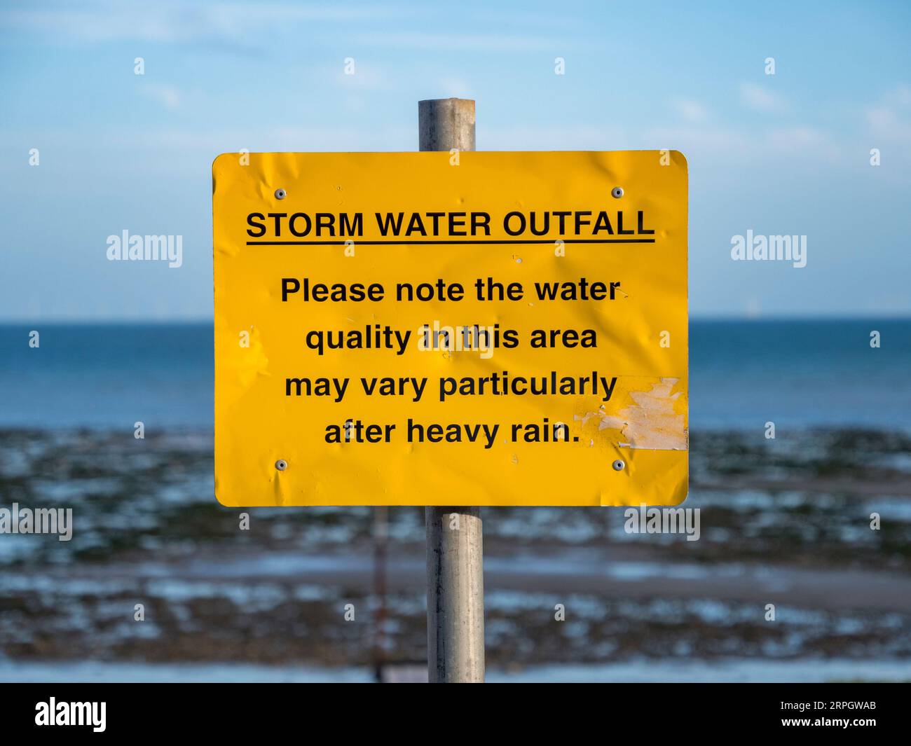 'Storm Water Outfall' sign on Worthing Beach, West Sussex, UK. Stock Photo