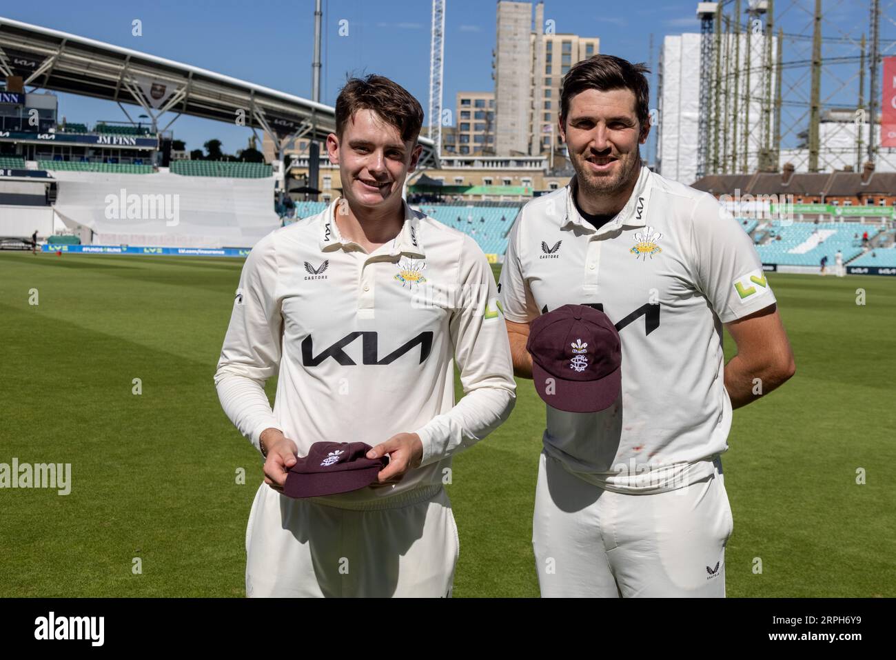 London, UK. 4th Sep, 2023. Jame Smith and Jamie Overton presented with Surrey Caps from Surrey Chair Martin Eadon during the lunch break as Surrey take on Warwickshire in the County Championship at the Kia Oval, day two. Credit: David Rowe/Alamy Live News Stock Photo