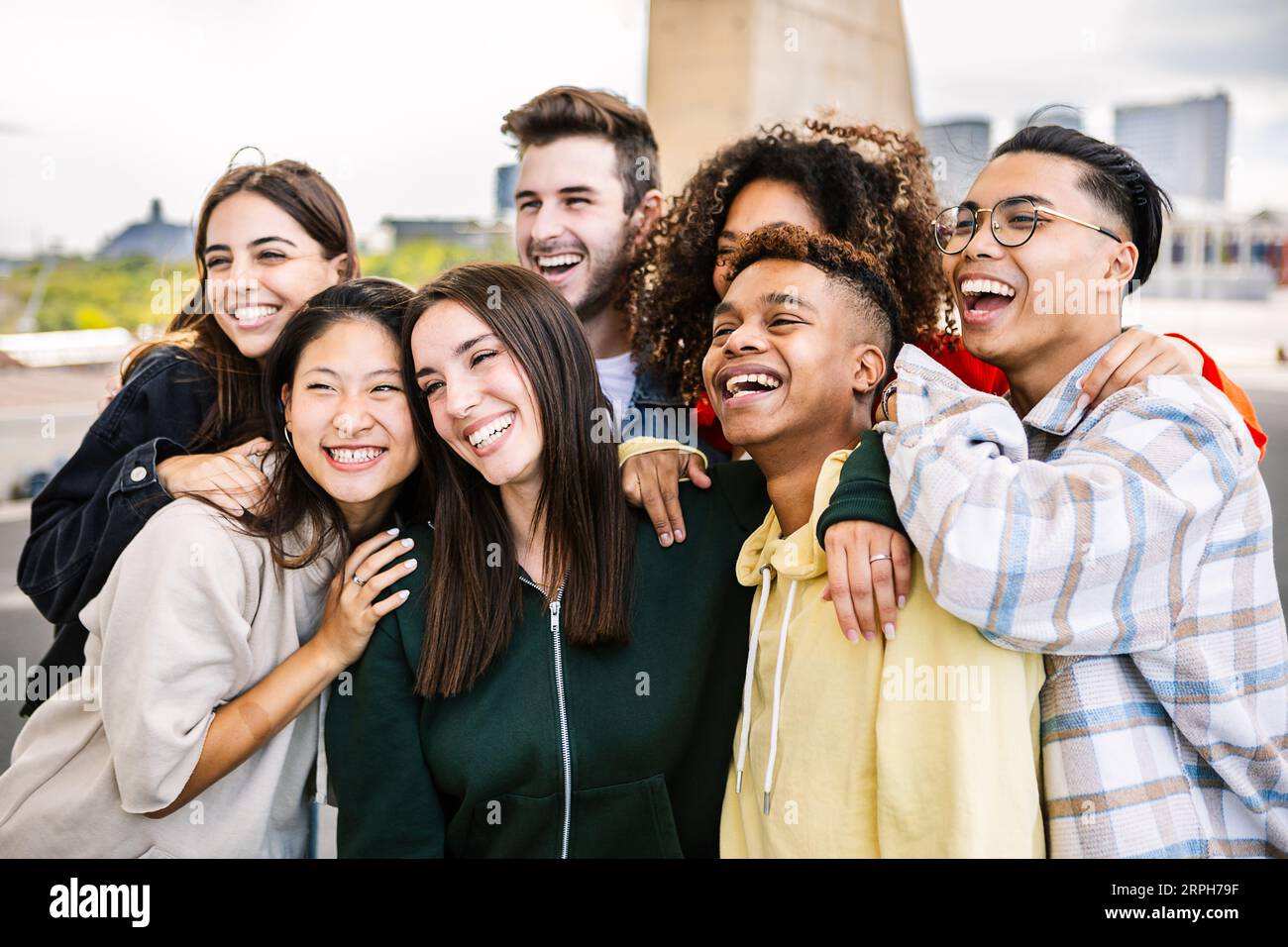 Diverse teenage student people standing together posing for group photo