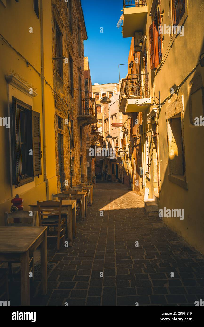 Embark on a journey through time as you stroll along the narrow streets of Rethymno. These ancient alleys, a hallmark of Mediterranean towns, resonate Stock Photo