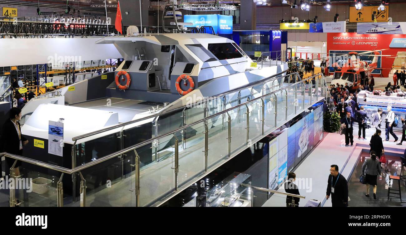 191108 -- SHANGHAI, Nov. 8, 2019 -- Photo taken on Nov. 7, 2019 shows the FSD 195 fast patrol boat, made by Italian shipbuilder Ferretti, at the Equipment exhibition area during the second China International Import Expo CIIE in Shanghai, east China. Intelligent and high-end manufacturing solutions make the Equipment exhibition area a highlight at the second CIIE from Nov. 5 to Nov. 10. Various kinds of products, such as public service vessels, draglines, precision machine tools, micro chips, softwares, etc., are displayed by companies who are seeking business opportunities in the Chinese mark Stock Photo