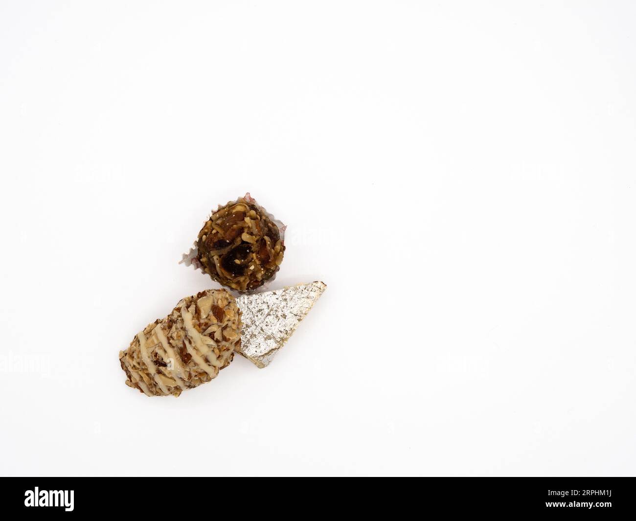 Three varieties of pure ghee sweets from India, each with its own