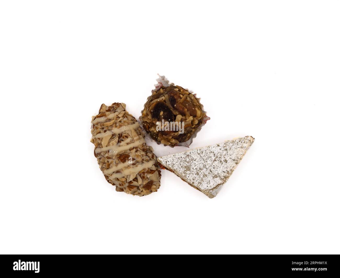 Three varieties of pure ghee sweets from India, each with its own