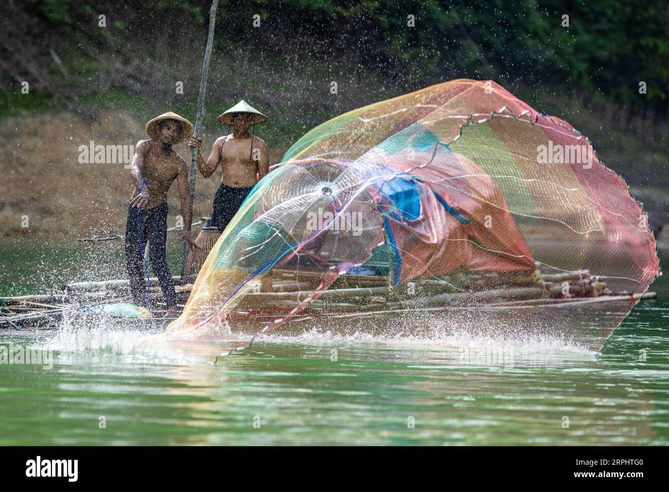 Throw fishing net at Pedu's Lake located at Kedah state of Malaysia Stock  Photo - Alamy