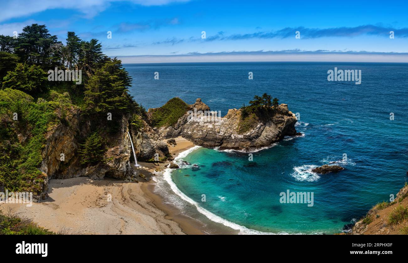 McWay Falls along the Big Sur coast in Julia Pfeiffer Burns State Park, California. One of a few that falls into the ocean, it's an incredibly scenic Stock Photo