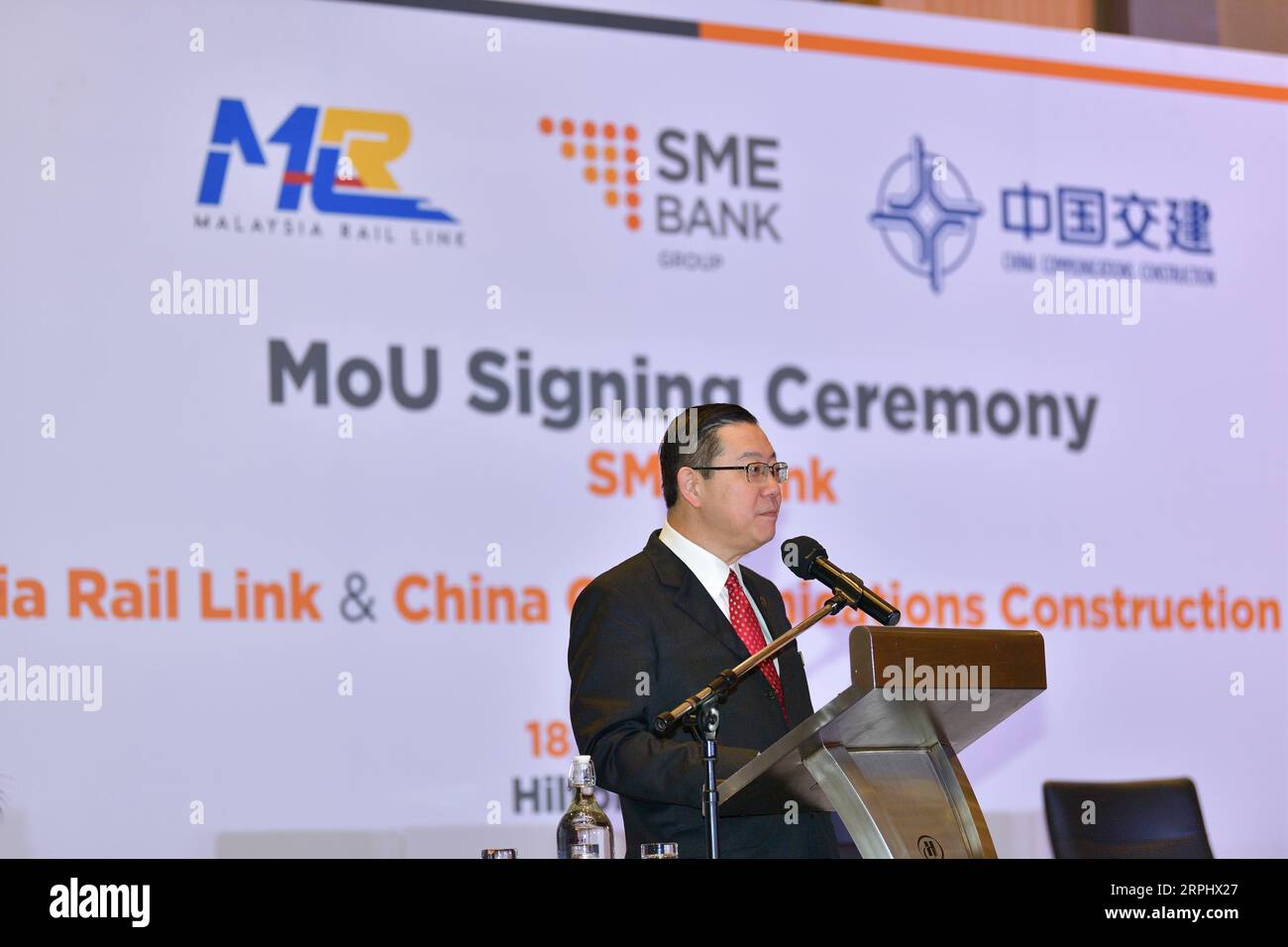 191118 -- KUALA LUMPUR, Nov. 18, 2019 Xinhua -- Malaysian Finance Minister Lim Guan Eng speaks at a memorandum of understanding MoU signing ceremony in Kuala Lumpur, Malaysia, Nov. 18, 2019. Small Medium Enterprise Development Bank Malaysia SME Bank announced on Monday to set aside 1 billion ringgit 240 million U.S. dollars specially for local contractors, which are expected to take a significant part in the East Coast Rail Link ECRL, a major infrastructure project and cooperation between Malaysia and China. The development financial institution under the Malaysia Ministry of Entrepreneur Deve Stock Photo