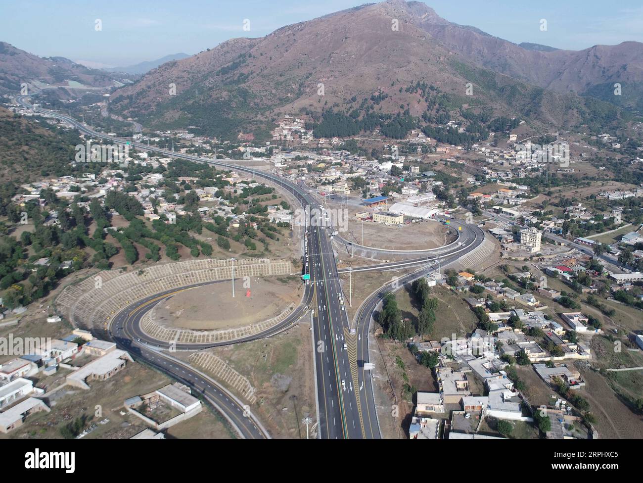 191119 -- HAVELIAN, Nov. 19, 2019 -- Photo taken on Nov. 18, 2019 shows a view of the expressway section of the Karakorum Highway KKH project phase two in Pakistan. The expressway section of the KKH project phase two was inaugurated in Havelian in northwestern Pakistan on Monday, marking another step forward to complete the early harvest project under the China-Pakistan Economic Corridor CPEC. The inaugurated expressway section from Havelian to Mansehra, is 40 km with four lanes. The rest 80-km secondary roads under the KKH phase two project is expected to be completed in February 2020.  PAKIS Stock Photo