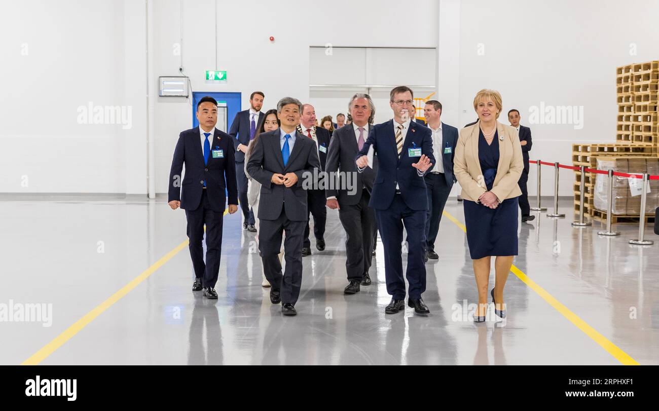 191119 -- DUBLIN, Nov. 19, 2019 -- Irish Minister for Business, Enterprise and Innovation Heather Humphreys1st R in front visits an infant formula plant in Monaghan, northeast Ireland, Nov. 18, 2019. A ceremony to mark the completion of the construction of the infant formula production factory by a Chinese company was held in Ireland s northeast County Monaghan on Monday. Located in Carrickmacross, the second largest town in County Monaghan, the new factory with an investment of over 20 million euros about 22 million U.S. dollars, which is fully funded by Shanghai Newbaze Dairy Product Co., Lt Stock Photo