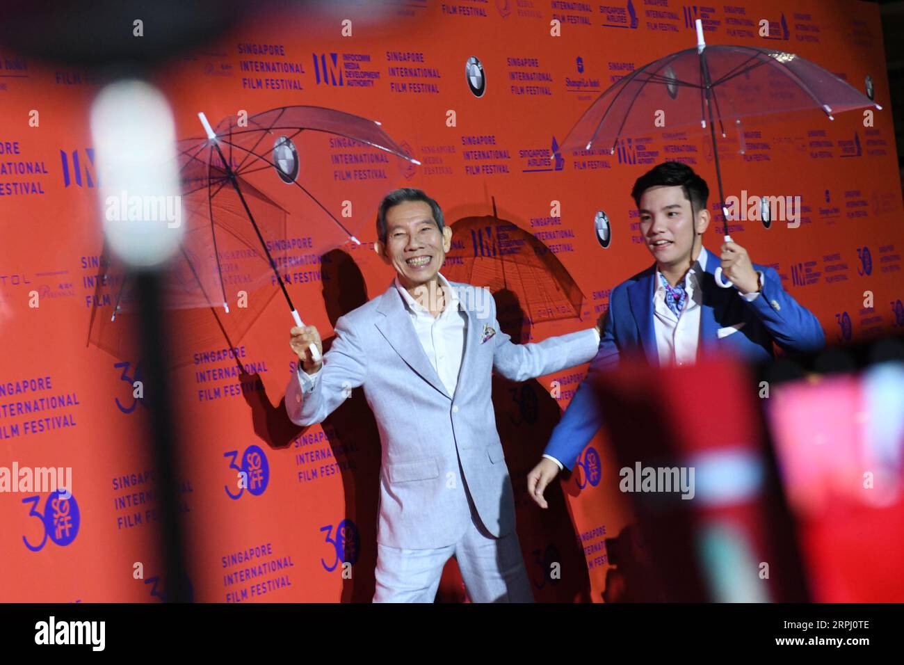 191122 -- SINGAPORE, Nov. 22, 2019 -- Actors Yang Shi Bin L and Koh Jia ...