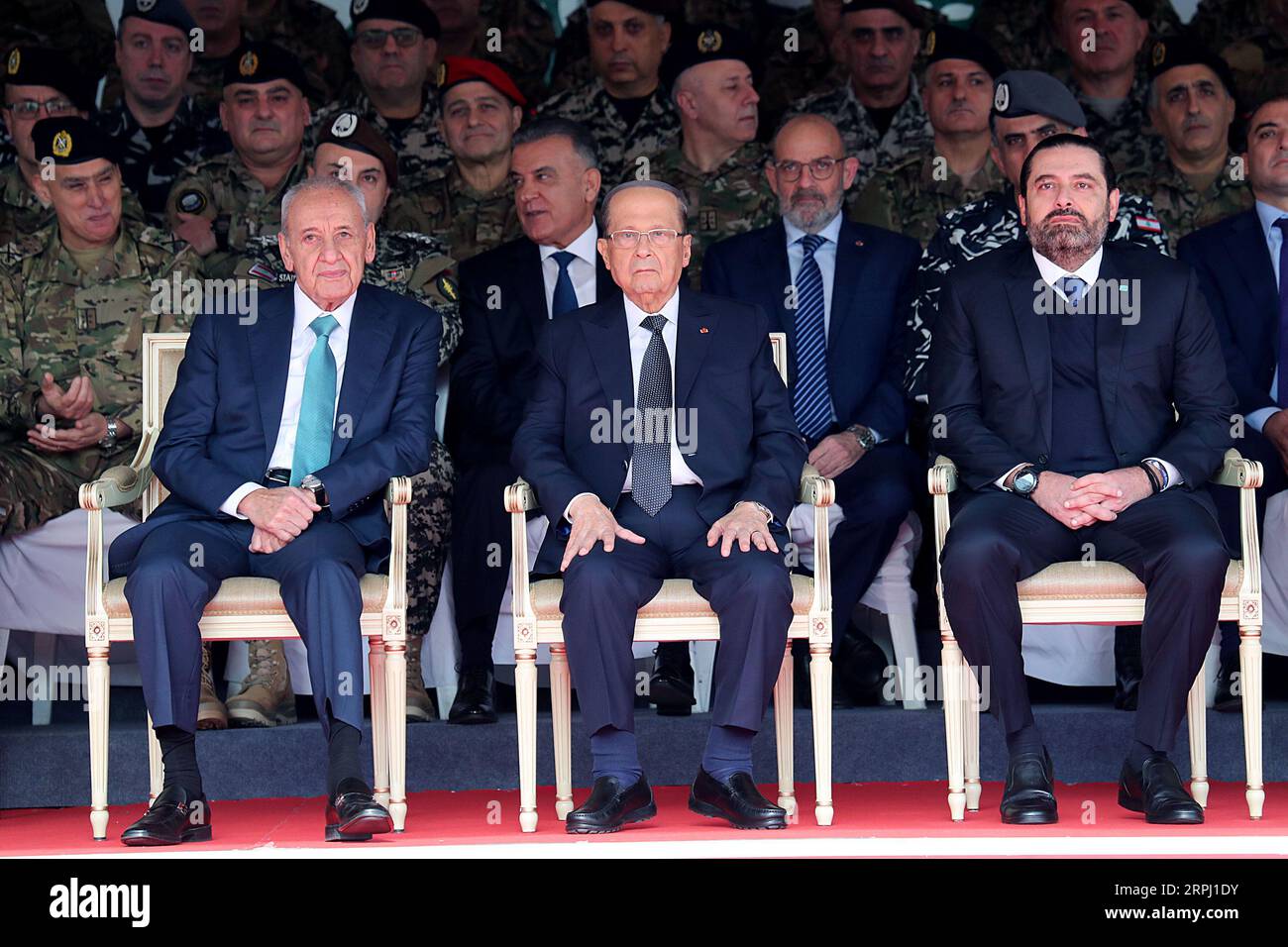 191122 -- YARZEH LEBANON, Nov. 22, 2019 Xinhua -- Lebanese President Michel Aoun C, Front, House Speaker Nabih Berri L, Front and caretaker Prime Minister Saad Hariri R, Front attend a military parade ceremony at the Defense Ministry in Yarzeh, southeast of Beirut, Lebanon, on Nov. 22, 2019. Lebanon s top officials celebrated on Friday the country s Independence Day at the Defense Ministry in Yarzeh, the National News Agency reported. Dalati & Nohra/Handout via Xinhua LEBANON-YARZEH-INDEPENDENCE DAY-PARADE PUBLICATIONxNOTxINxCHN Stock Photo