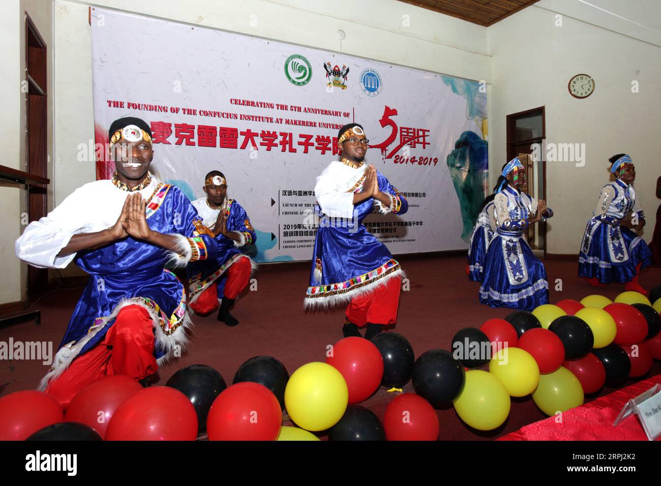 191124 -- KAMPALA, Nov. 24, 2019 Xinhua -- Students of the Confucius Institute at Makerere University perform at an event celebrating the 5th anniversary of the founding of the institute, in Kampala, Uganda, Nov. 23, 2019. Confucius Institute at Makerere University, Uganda s top university, on Saturday celebrated its fifth anniversary. The institution, as the nexus of Chinese language teaching, is playing a major role for cultural exchange between Uganda and China. Photo by Hajarah Nalwadda/Xinhua UGANDA-KAMPALA-MAKERERE UNIVERSITY-CONFUCIUS INSTITUTE-ANNIVERSARY PUBLICATIONxNOTxINxCHN Stock Photo