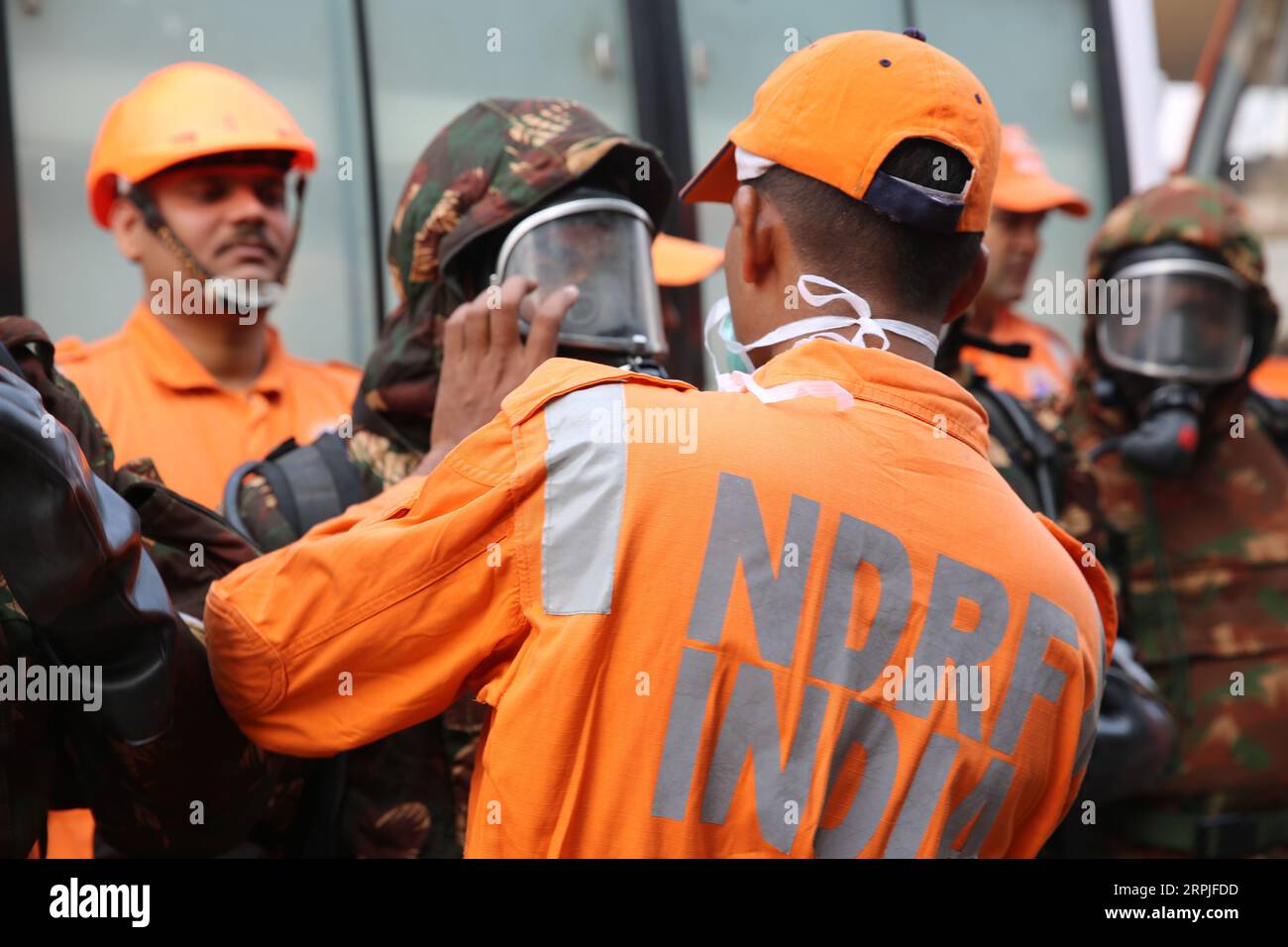 191208 -- NEW DELHI, Dec. 8, 2019 -- Rescuers prepare to enter the site of a fire incident in New Delhi, India, Dec. 8, 2019. At least 43 people died and more than 50 injured in the fire incident. The injured are undergoing medical treatment at four different hospitals. The fire broke out inside a four storey building in north Delhi s Filmistan area. Most of those died were migrant labourers from the country s eastern state of Bihar, and were asleep when the fire broke out in the early hours of Sunday.  INDIA-NEW DELHI-FIRE INCIDENT ZhaoxXu PUBLICATIONxNOTxINxCHN Stock Photo