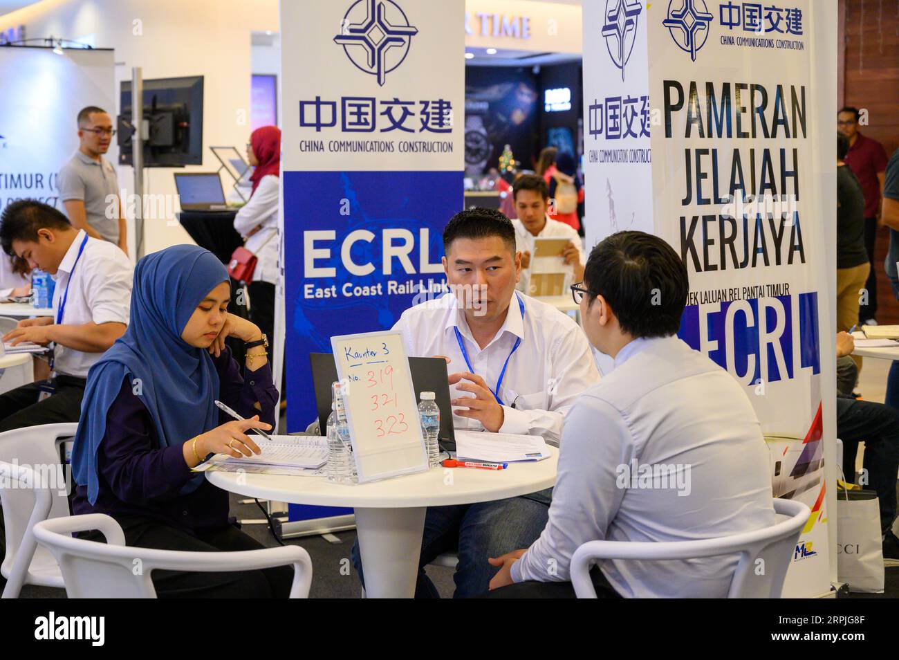 191209 -- KUANTAN, Dec. 9, 2019 -- A job-seeker R attends a recruitment roadshow of the East Coast Rail Link ECRL, a major infrastructure project between China and Malaysia, in Kuantan, Malaysia, Dec. 6, 2019.  Xinhua Headlines: Railway megaproject ECRL creating new opportunities in Malaysia as construction picks up ZhuxWei PUBLICATIONxNOTxINxCHN Stock Photo