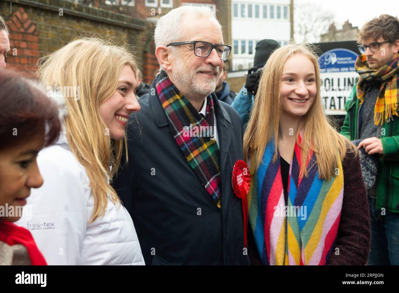 191212 -- LONDON, Dec. 12, 2019 -- British Labour Party Leader Jeremy Corbyn C poses with supporters at a polling station after casting his vote for the general election in London, Britain, Dec. 12, 2019. Polling stations opened in 650 constituencies across Britain at 7 a.m. 0700 GMT Thursday in the country s general elections. Photo by Ray Tang/Xinhua BRITAIN-LONDON-GENERAL ELECTION-JEREMY CORBYN HanxYan PUBLICATIONxNOTxINxCHN Stock Photo