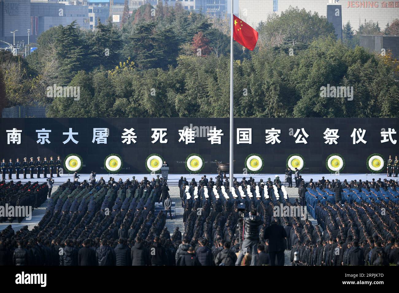 191213 -- NANJING, Dec. 13, 2019 -- Photo taken on Dec. 13, 2019 shows the scene of a national memorial ceremony to commemorate the victims of the Nanjing Massacre at the memorial hall for the massacre victims in Nanjing, east China s Jiangsu Province.  Xinhua Headlines: China holds national memorial ceremony for Nanjing Massacre victims HanxYuqing PUBLICATIONxNOTxINxCHN Stock Photo