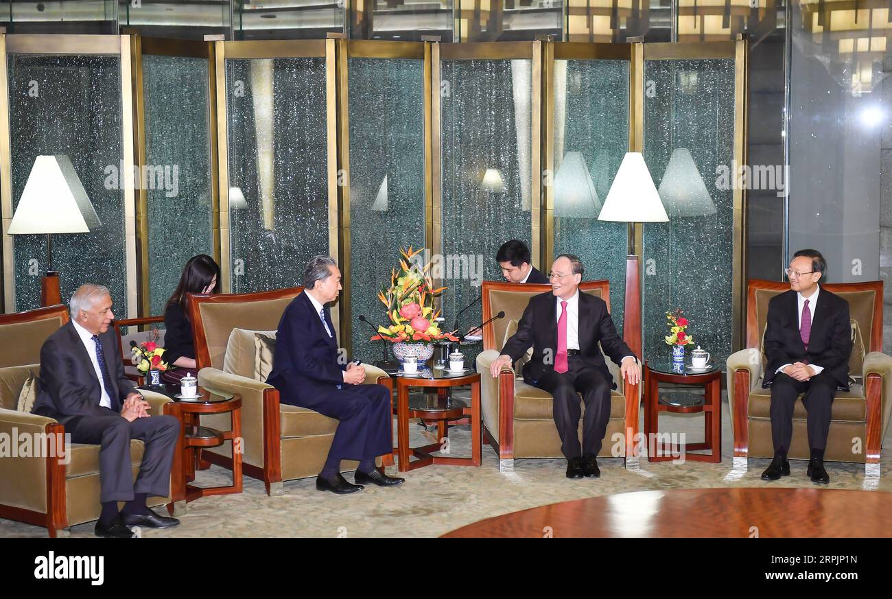191216 -- BEIJING, Dec. 16, 2019 -- Chinese Vice President Wang Qishan 2nd R meets with former Japanese Prime Minister Yukio Hatoyama 2nd L front and other former foreign politicians and foreign diplomats based in China prior to a reception commemorating the 70th anniversary of the founding of the Chinese People s Institute of Foreign Affairs CPIFA, in Beijing, capital of China, Dec. 16, 2019.  CHINA-BEIJING-WANG QISHAN-CPIFA-ANNIVERSARYCN LixXiang PUBLICATIONxNOTxINxCHN Stock Photo