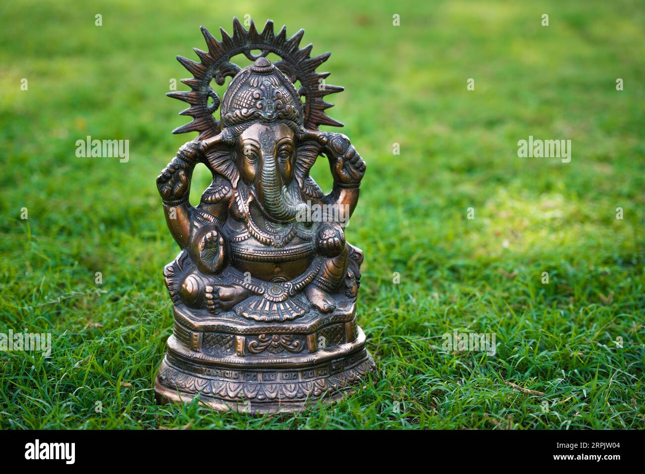 Idol of loard Ganesha outdoor at park, Ganesh Chaturthi festival. Background Stock Photo