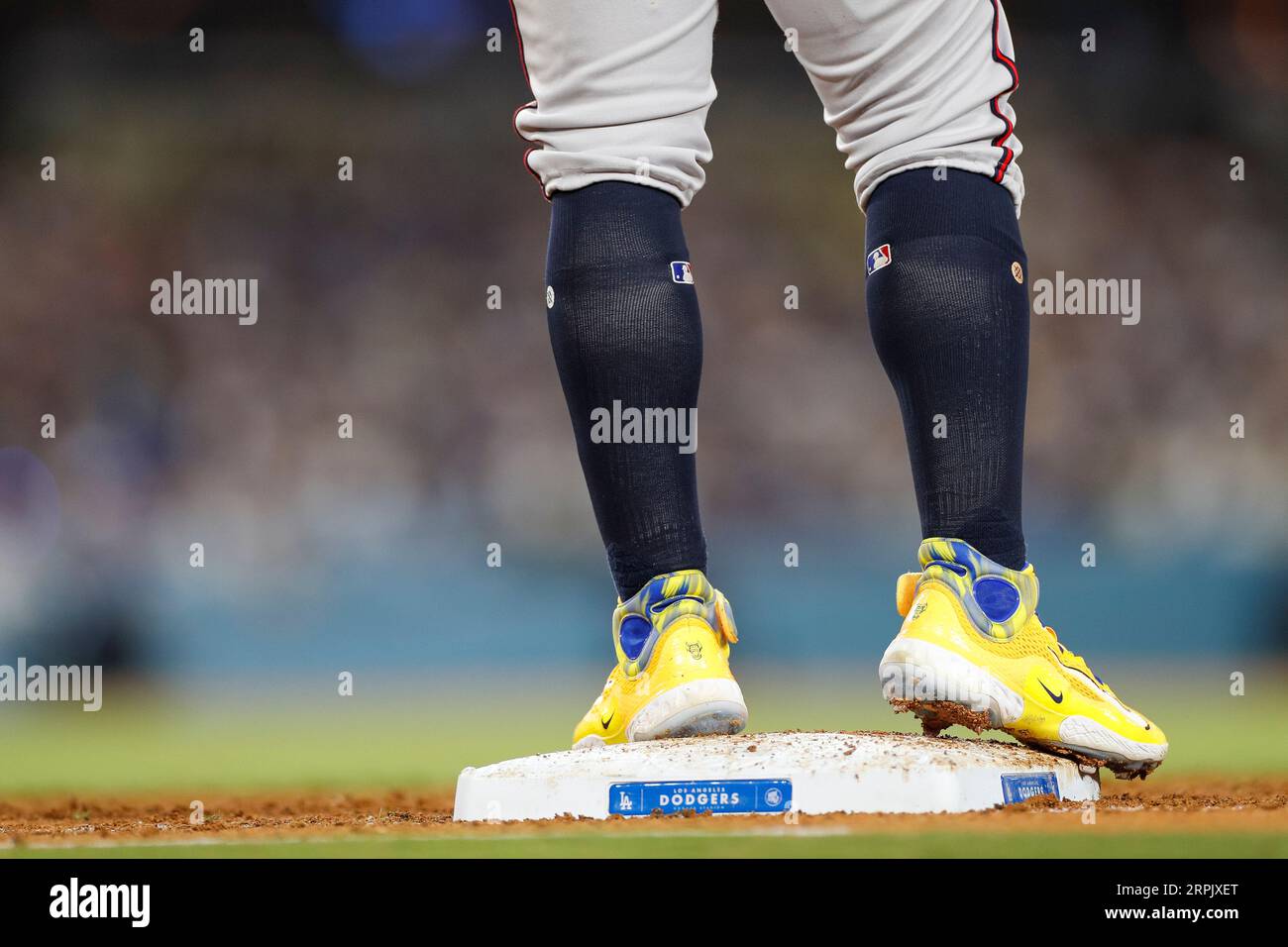 A detailed view of the Nike cleats worn by Ronald Acuna Jr. #13 of