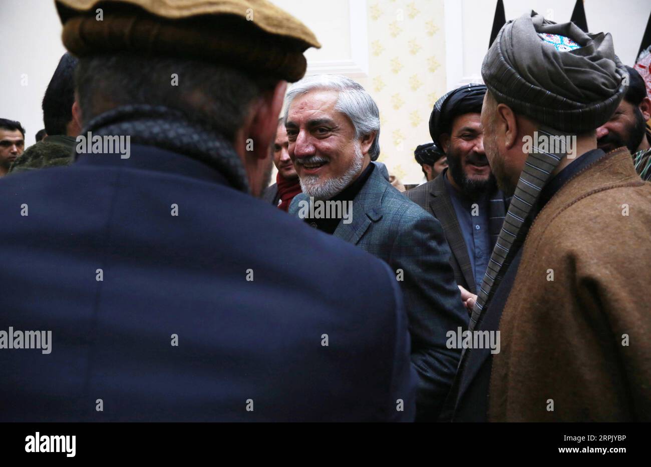 191222 -- KABUL, Dec. 22, 2019 -- Afghan presidential candidate Abdullah Abdullah C leaves after a press conference in Kabul, capital of Afghanistan, on Dec. 22, 2019. Afghan President Mohammad Ashraf Ghani has welcomed the preliminary results of the presidential election announced on Sunday as fair and expressed his congratulations to the nation and gratitude to the election commission. However, his rival in the presidential race Abdullah Abdullah described it as a fraudulent practice and vowed to fight through legal means until the fake votes were separated from the legitimate ones.  AFGHANI Stock Photo