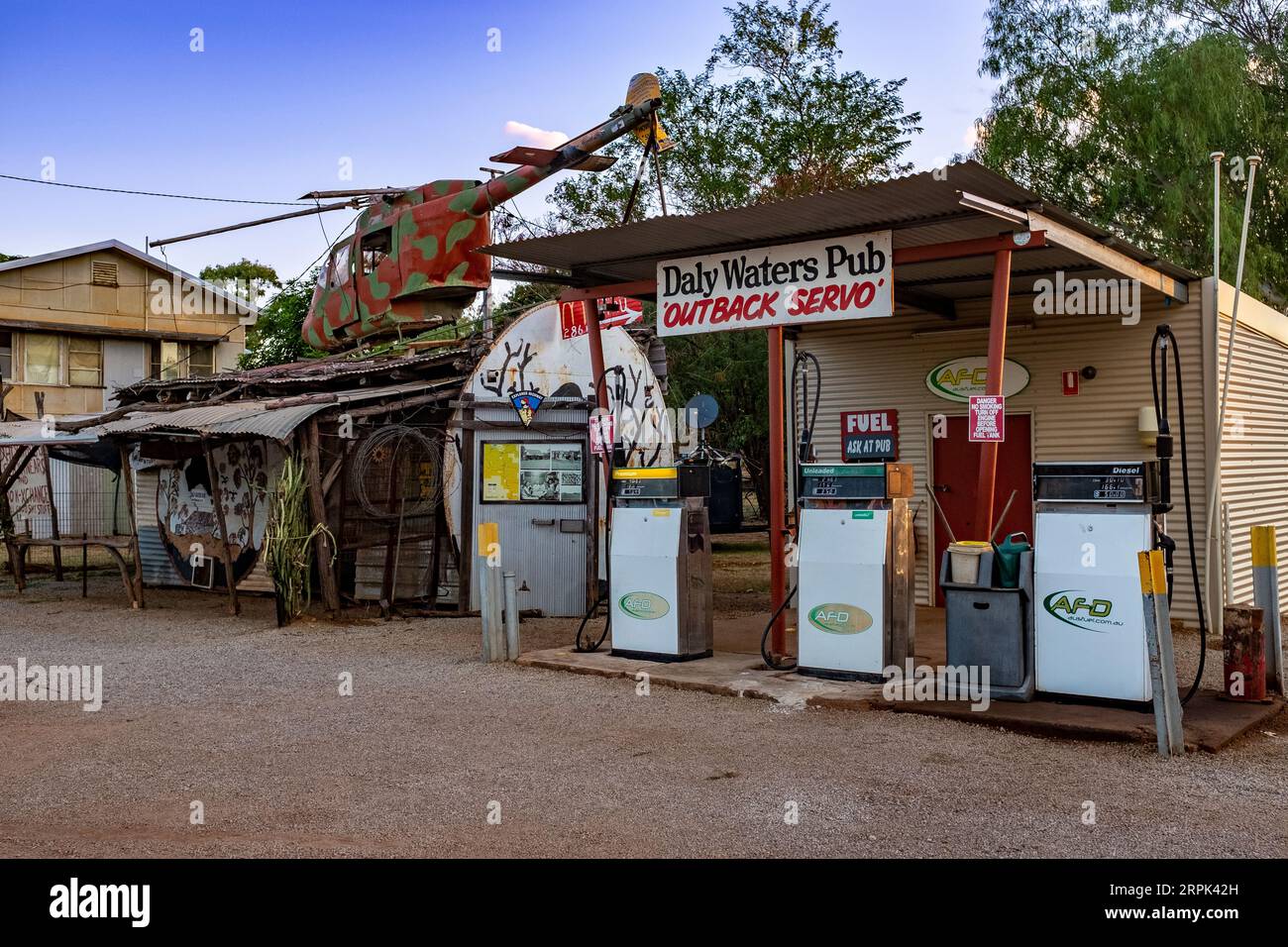Notable for the helicopter wreck on its roof, The Daly Waters Pub, and service station in Daly Waters an isolated town (pop. 55) 820 kilometres south of Darwin in the Northern Territory. Stock Photo