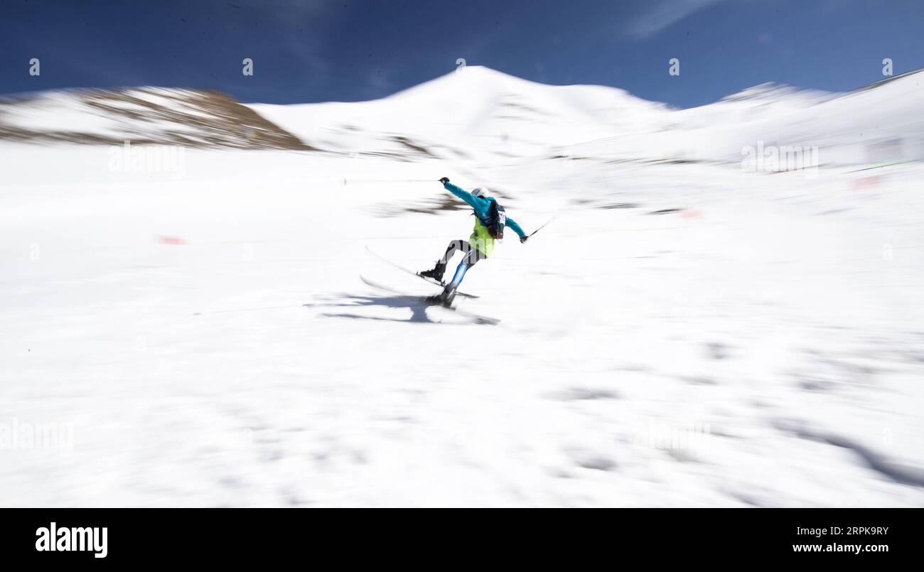 200105 -- BEIJING, Jan. 5, 2020 -- A participant competes during the 2019 world ski mountaineering masters Mt. Gangshika in Menyuan County, northwest China s Qinghai Province, May 24, 2019.  Xinhua Headlines: Qinghai tourism set to blossom with winter sports boom WuxGang PUBLICATIONxNOTxINxCHN Stock Photo