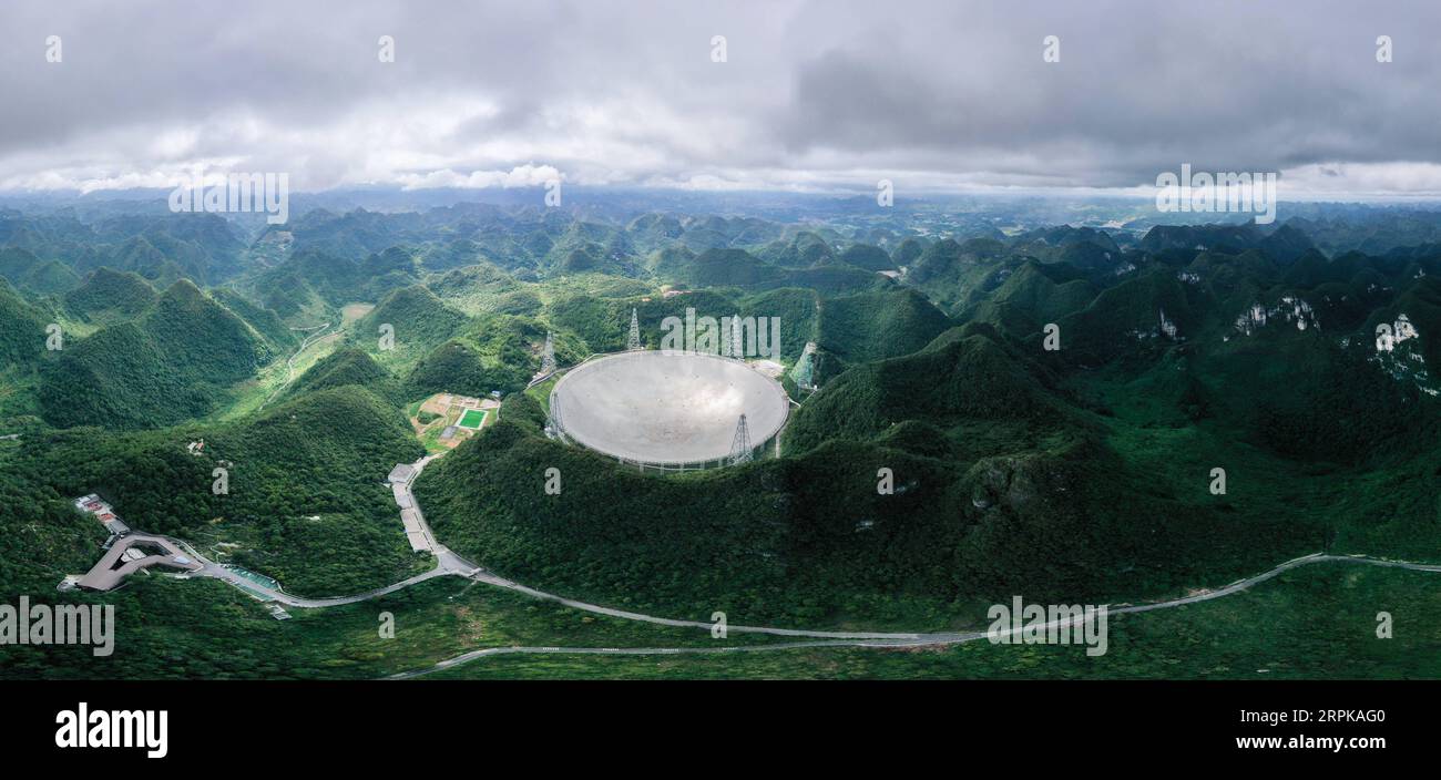 200105 -- BEIJING, Jan. 5, 2020 -- Aerial photo taken on Aug. 27, 2019 shows China s Five-hundred-meter Aperture Spherical Radio Telescope FAST, the world s largest single-dish radio telescope dubbed as the China Sky Eye , in Pingtang County, southwest China s Guizhou Province.  XINHUA-PICTURES OF THE YEAR 2019-AERIAL PHOTO OuxDongqu PUBLICATIONxNOTxINxCHN Stock Photo