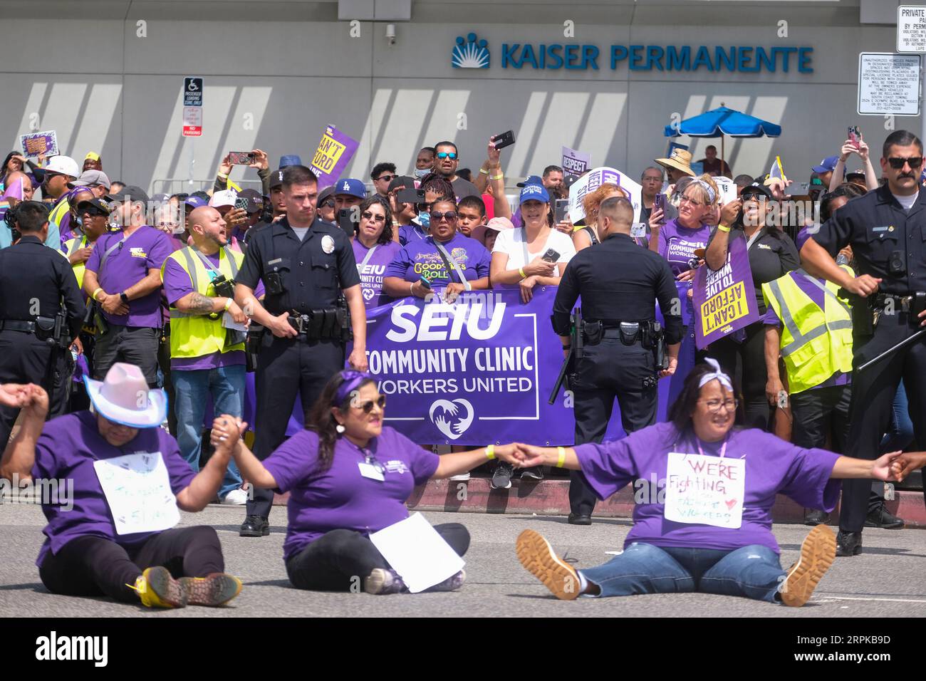 Los Angeles, United States. 04th Sep, 2023. Police stand as health care ...