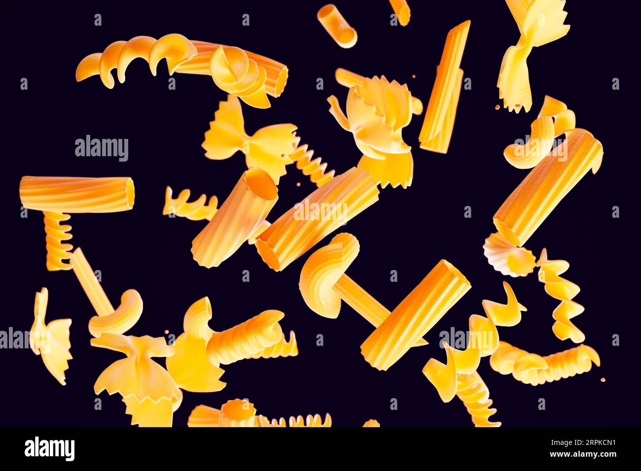 A variety of raw pasta shapes captured in mid-air. High-speed photography Stock Photo