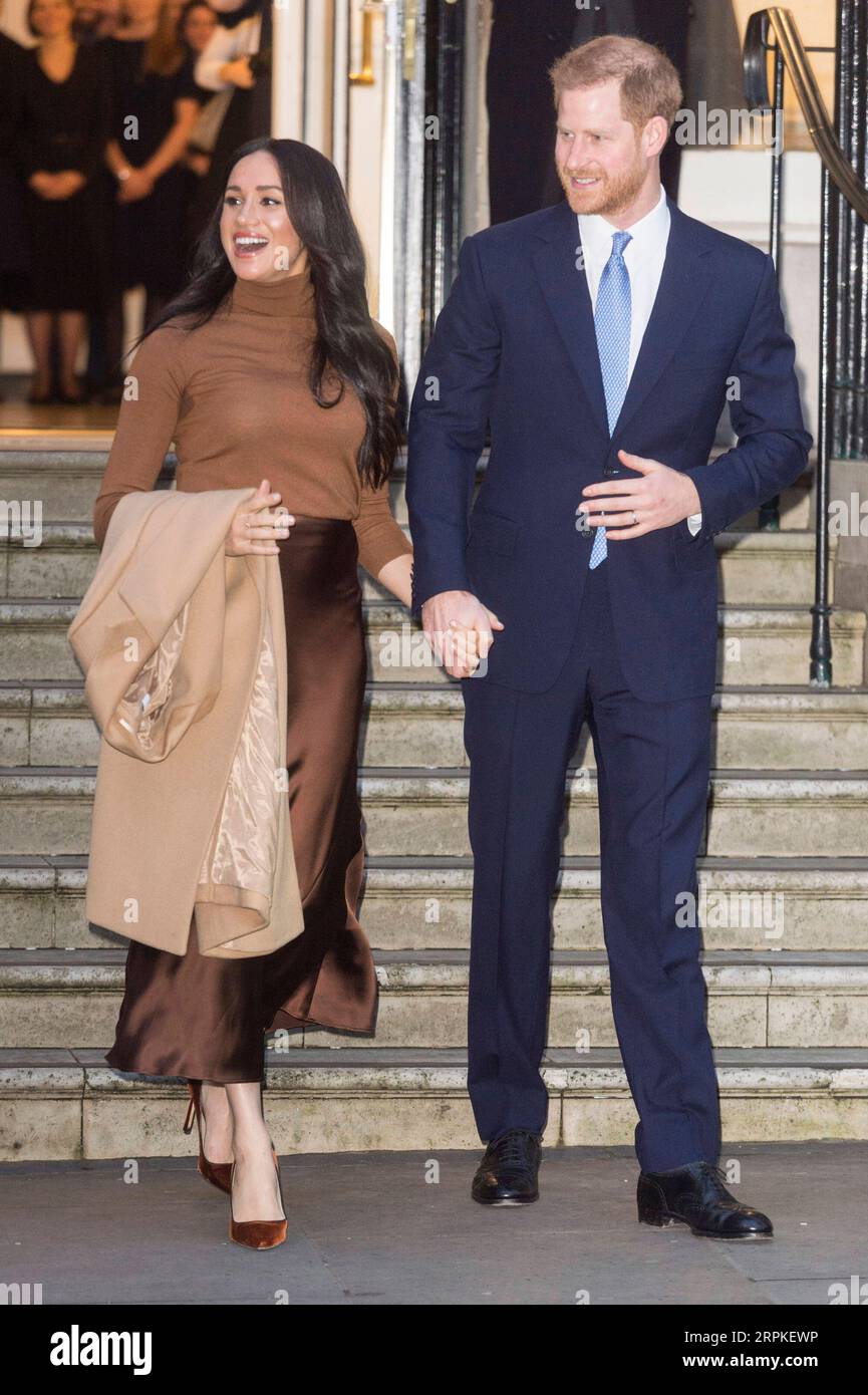 200109 -- LONDON, Jan. 9, 2020 Xinhua -- Prince Harry, Duke of Sussex and Meghan, Duchess of Sussex, depart after a visit at Canada House in London, Britain on Jan. 7, 2020. The Duke and Duchess of Sussex s intention to step back from royal life dominated newspaper headlines in Britain Thursday. Photo by Ray Tang/Xinhua BRITAIN-LONDON-DUKE AND DUCHESS OF SUSSEX-ANNOUNCEMENT PUBLICATIONxNOTxINxCHN Stock Photo