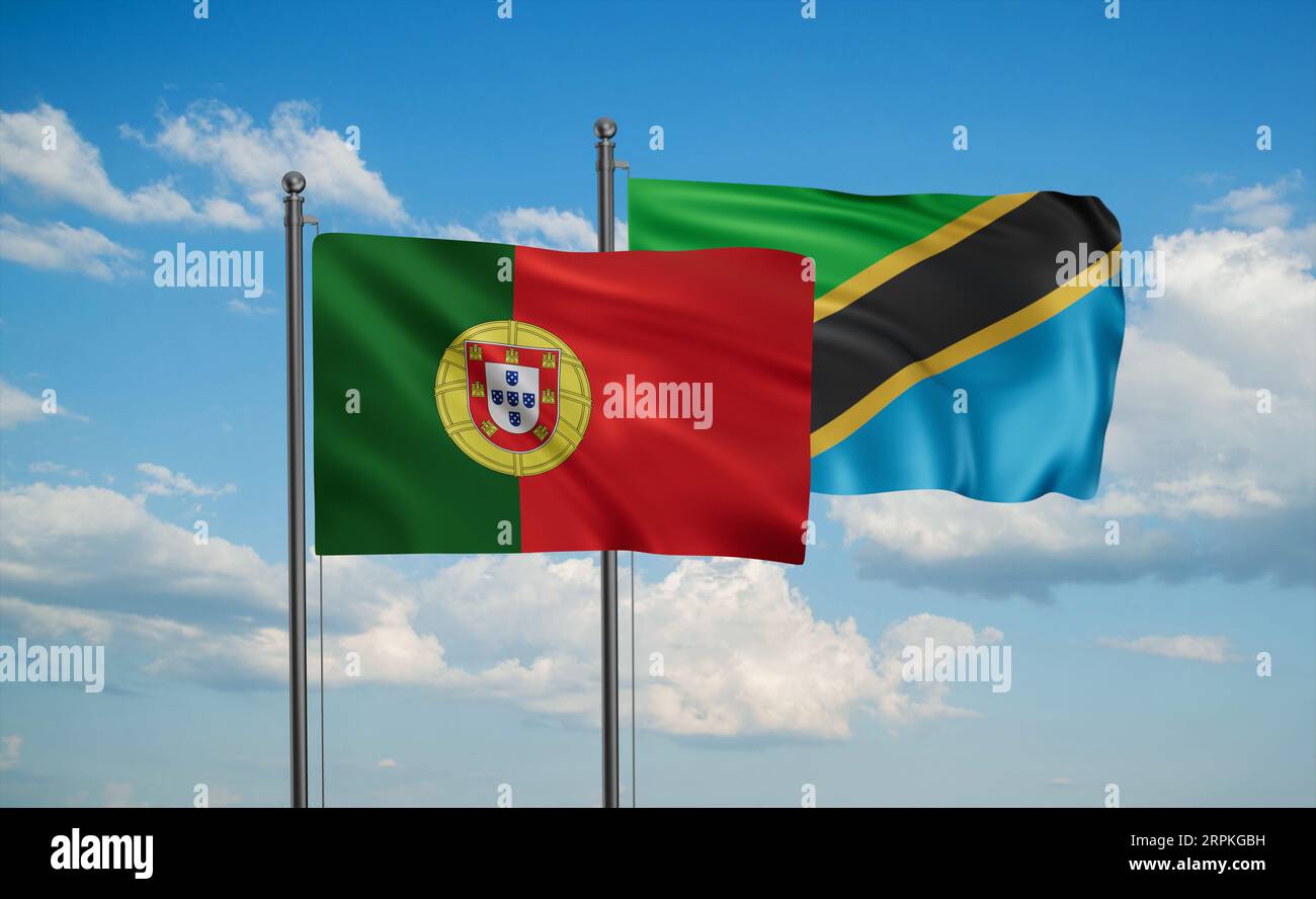 Tanzania and Portugal flag waving together in the wind on blue sky, two ...