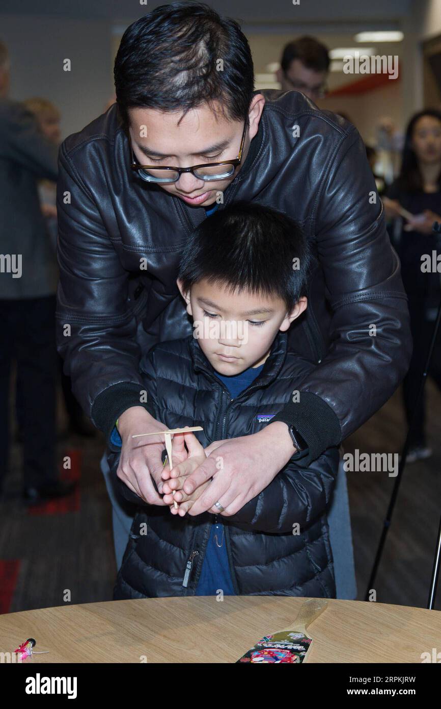 200113 DALLAS Jan 13 2020 A Man Teaches His Son How To Fly A 200113-dallas-jan-13-2020-a-man-teaches-his-son-how-to-fly-a