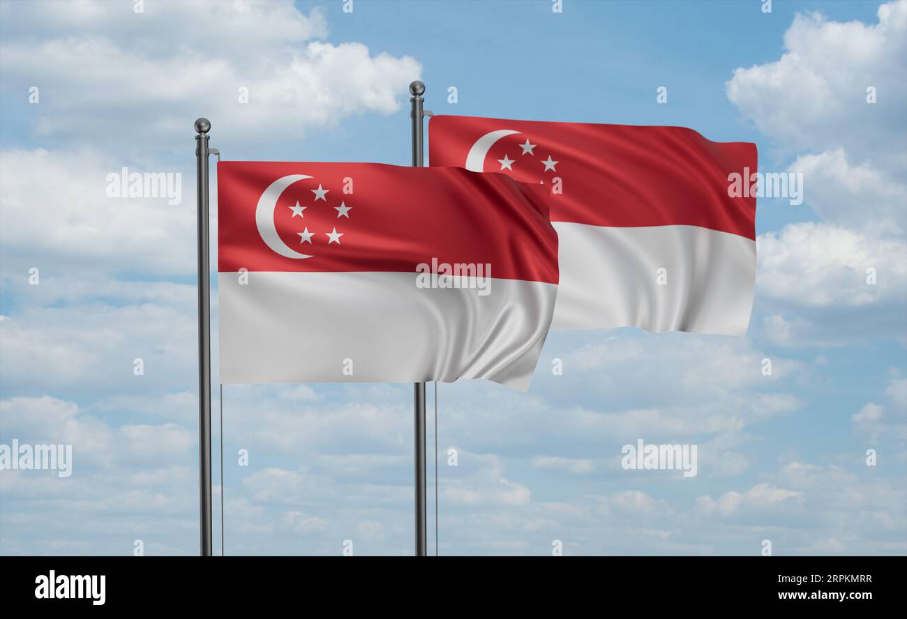 Two Republic of Singapore flags waving together in the wind on blue sky ...