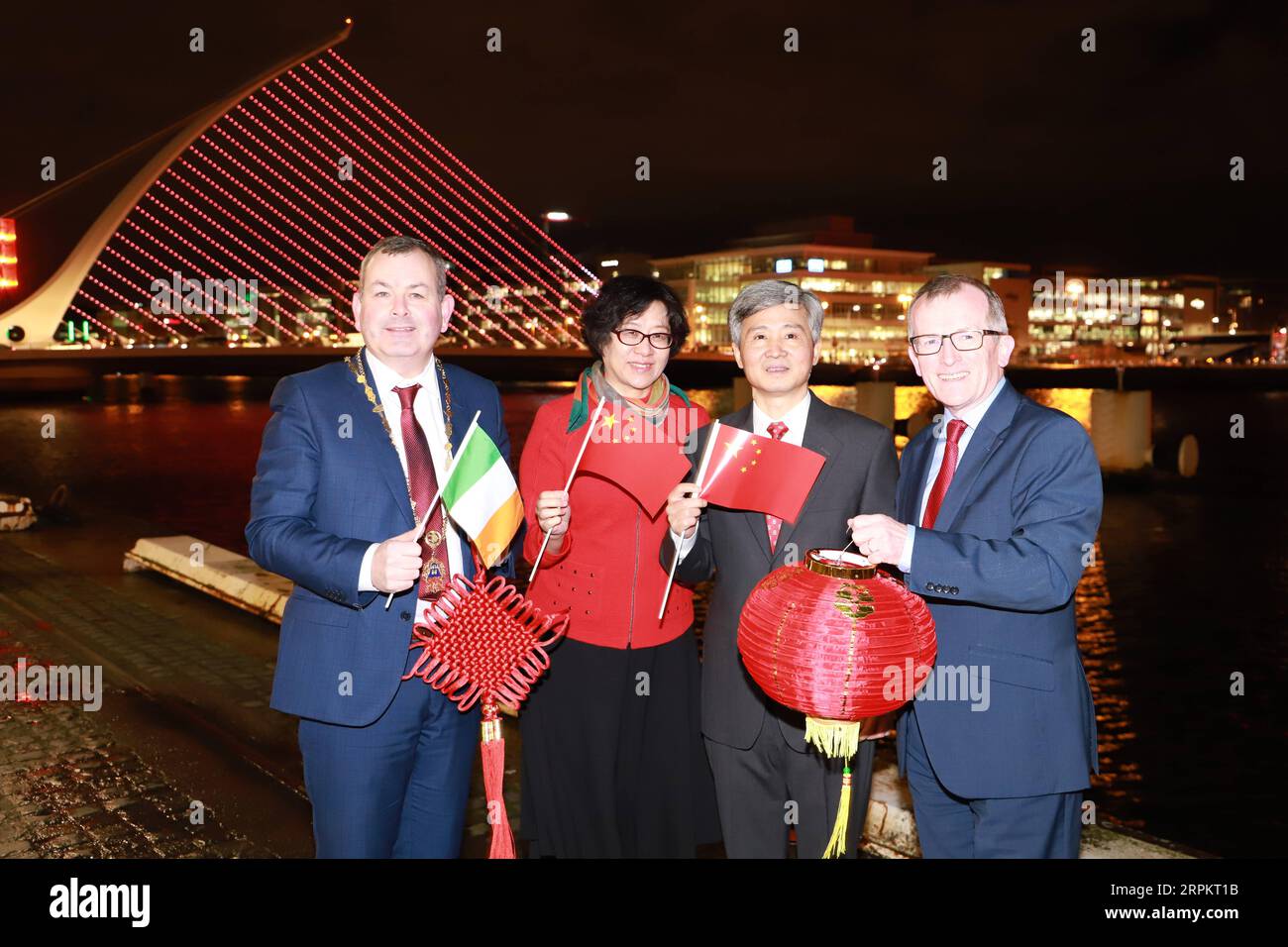 200117 -- DUBLIN, Jan. 17, 2020 -- Chinese Ambassador to Ireland He Xiangdong 2nd R and his wife Xia Lining 2nd L, Deputy Mayor of Dublin Tom Brabazon 1st L, and Tourism Ireland Chief Executive Niall Gibbons attend a ceremony to light up Dublin red for the coming Chinese New Year at the famous Samuel Beckett Bridge in Dublin, Ireland, Jan. 16, 2020. A launch ceremony to light up Dublin red for the coming Chinese New Year was held here on Thursday evening. Light up with Chinese Red is an initiative first put forward by Dublin City Council five years ago and later copied by many other cities and Stock Photo