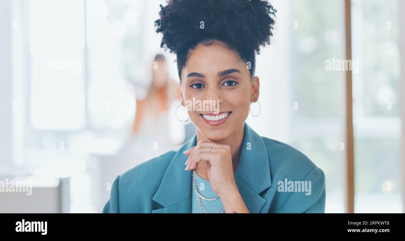 Portrait of woman in creative agency with smile, confidence and pride in admin at design agency. Face of female designer at modern office desk Stock Photo