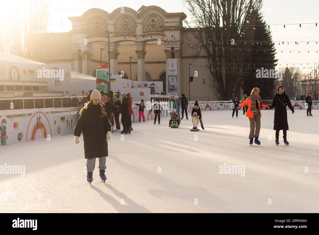 KYIV, UKRAINE - Dec. 23, 2022: Ice-skating people. People have fun in ...