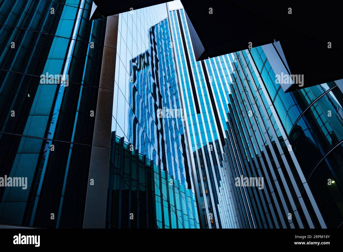 Modern abstract reflections in glass fronted office buildings in the ...