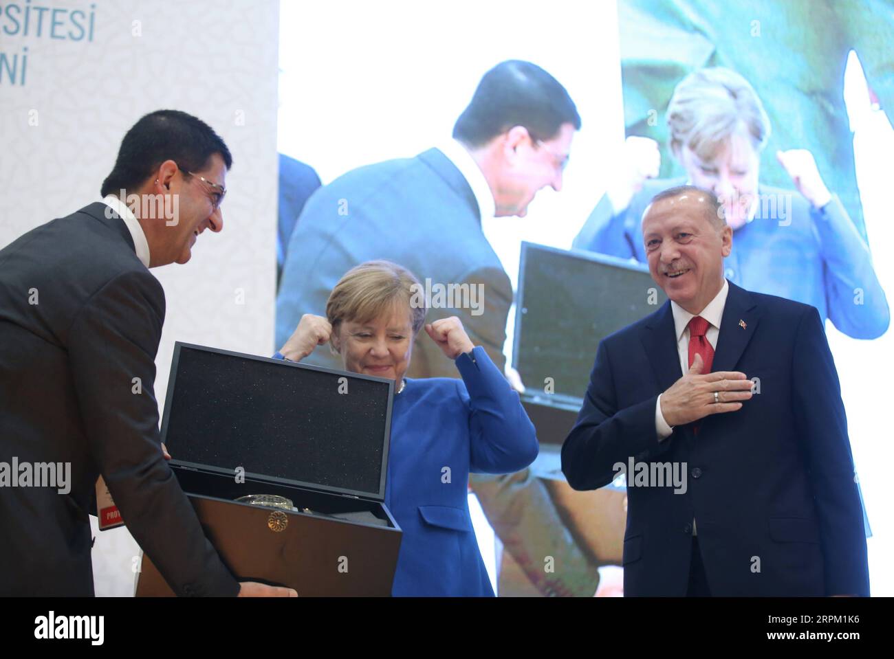 200124 -- ISTANBUL, Jan. 24, 2020 -- German Chancellor Angela Merkel C attends the opening ceremony of the Turkish-German University with Turkish President Recep Tayyip Erdogan R in Istanbul, Turkey, Jan. 24, 2020. Merkel on Friday said her country appreciates Turkey s efforts in hosting millions of Syrian refugees on its soil. Turkish Presidency/Handout via Xinhua TURKEY-ISTANBUL-TURKISH-GERMAN UNIVERSITY-OPENING CEREMONY XuxSuhui PUBLICATIONxNOTxINxCHN Stock Photo