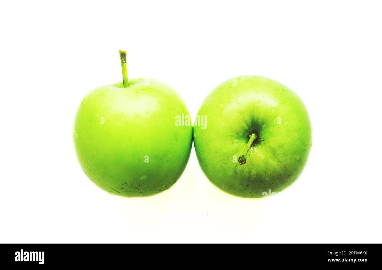 two wet green apples isolated Stock Photo