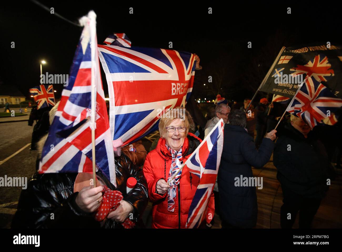 200201 -- BELFAST, Feb. 1, 2020 -- Pro-Brexit supporters celebrate Brexit outside Stormont in east Belfast, Northern Ireland, Britain on Jan. 31, 2020. Britain officially left the European Union EU at 11 p.m. 2300 GMT Friday, putting an end to its 47-year-long membership of the world s largest trading bloc. Photo by Paul McErlane/Xinhua BRITAIN-BELFAST-BREXIT HanxYanPaulMcErlane PUBLICATIONxNOTxINxCHN Stock Photo