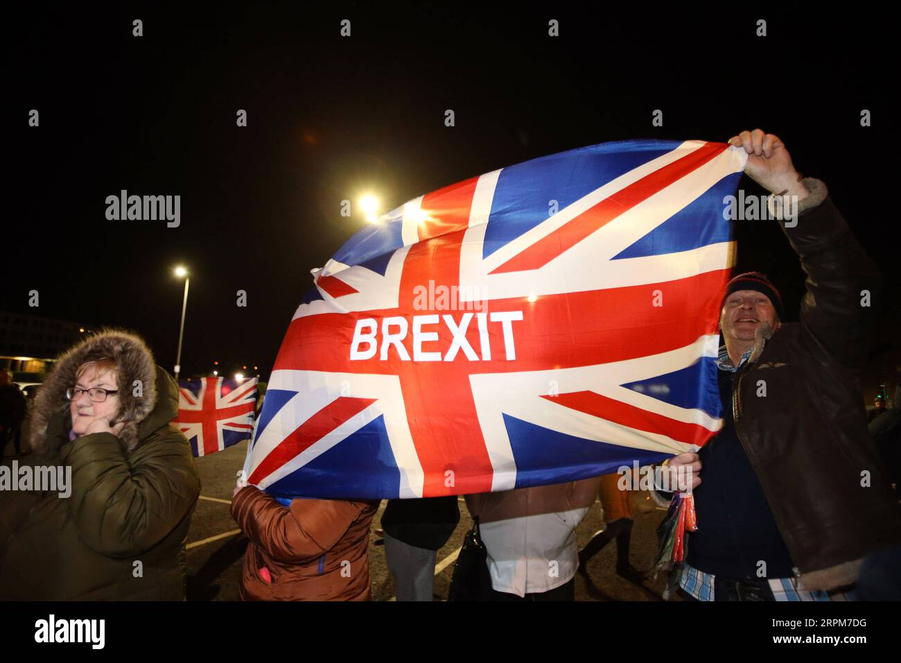 200201 -- BELFAST, Feb. 1, 2020 -- Pro-Brexit supporters celebrate Brexit outside Stormont in east Belfast, Northern Ireland, Britain on Jan. 31, 2020. Britain officially left the European Union EU at 11 p.m. 2300 GMT Friday, putting an end to its 47-year-long membership of the world s largest trading bloc. Photo by Paul McErlane/Xinhua BRITAIN-BELFAST-BREXIT HanxYanPaulMcErlane PUBLICATIONxNOTxINxCHN Stock Photo