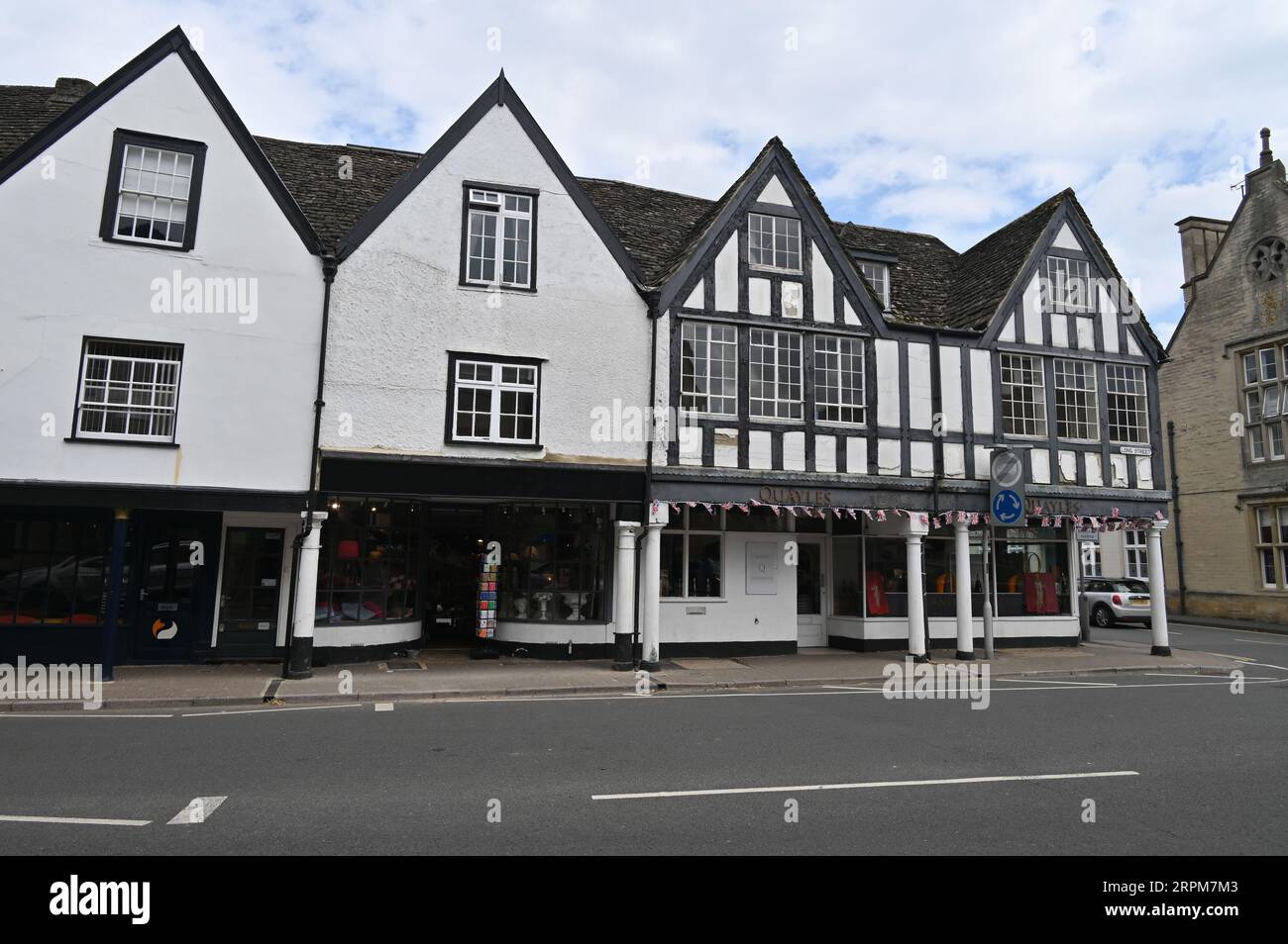 A row of shops on Long Street, Tetbury, Gloucestershire Stock Photo