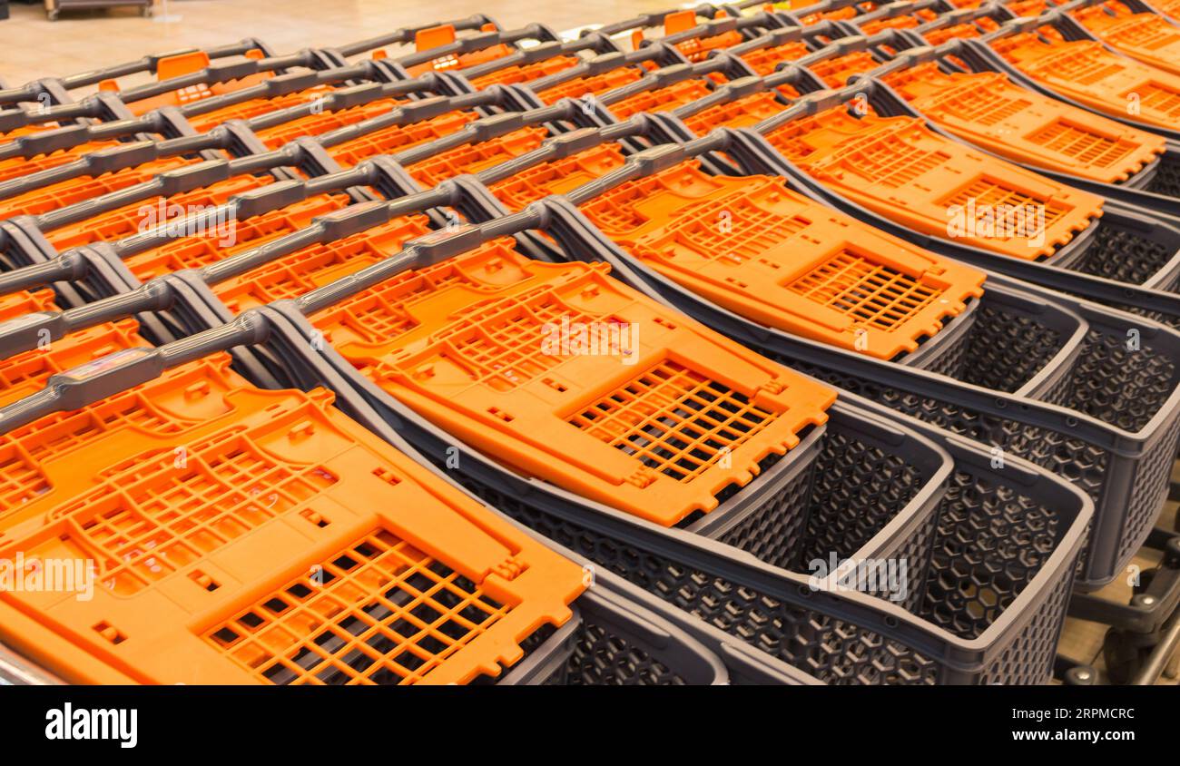Shopping carts in shopping mall. Marketplace. Stacked shopping carts. Retail place. Shopping