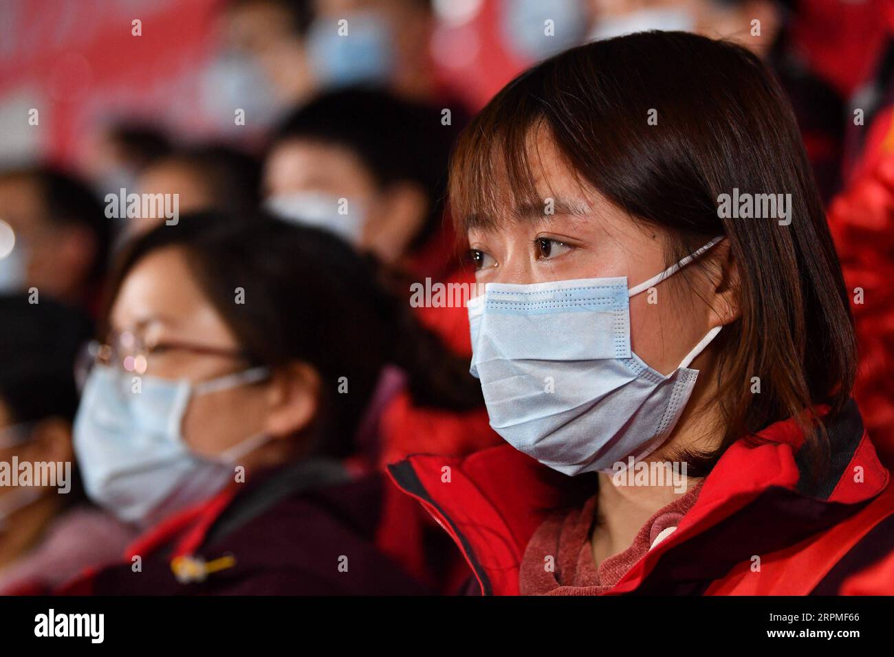 200211 -- GUANGZHOU, Feb. 11, 2020 -- Medical team members from Nanfang Hospital are seen on a ceremony before leaving for Jingzhou of Hubei, in Guangzhou, south China s Guangdong Province, Feb. 10, 2020. A 109-member medical team of Guangdong departed on Monday for Jingzhou, central China s Hubei Province, as the first batch of medical staff sent to aid the novel coronavirus control efforts there. Guangdong will send altogether four batches, nearly a thousand medics, to Jingzhou under national plan.  CHINA-GUANGDONG-GUANGZHOU-MEDICAL TEAM-AID CN LiuxDawei PUBLICATIONxNOTxINxCHN Stock Photo