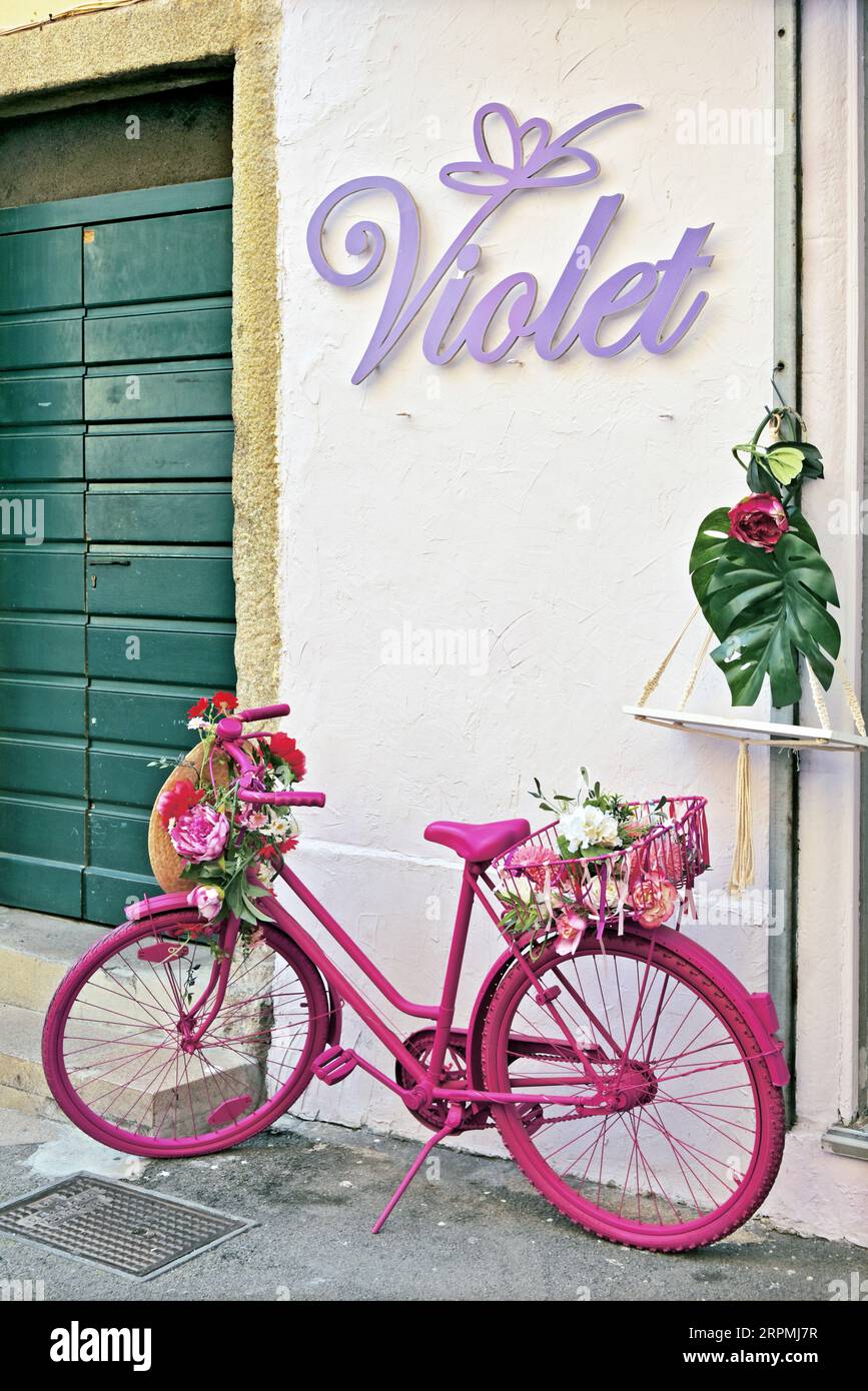 bike as decoration in front of a shop in Ajaccio, France, Corsica, Ajaccio Stock Photo